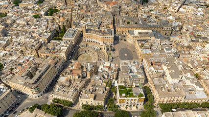 Aerial view of Sant'Oronzo square and the Roman amphitheater of Lecce, In Puglia, Italy. It is for...