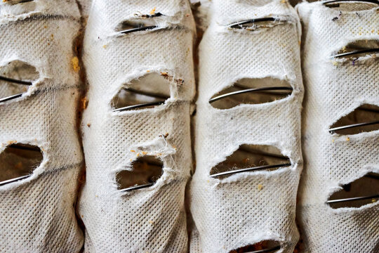 Worn independent spring unit side view after ten years of use, Pocket Spring technology, TFK, close-up of pocket springs.