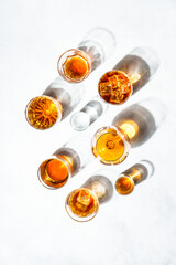 Strong alcohol drink. Cognac, whisky, rum, tequila at white background. Top view.
