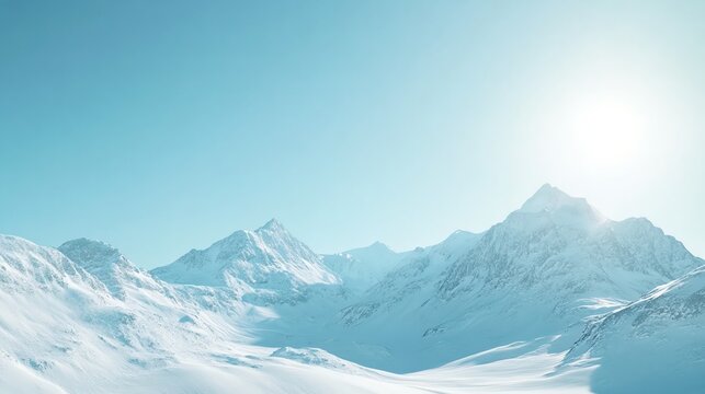 Snowy mountain peaks under a clear blue sky.