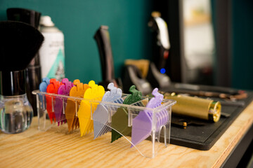 Barber supplies on a wooden countertop in a shop