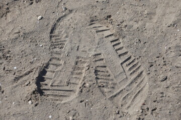 foot print (shoe print) on the  sand