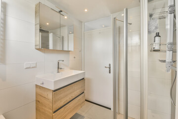 Modern and bright bathroom interior with shower