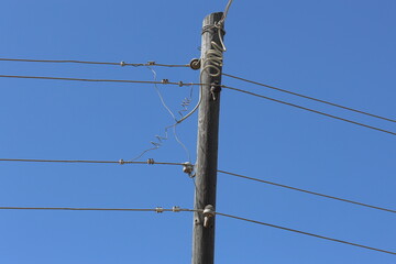 power lines against blue sky