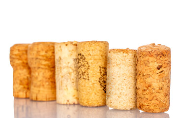 Several wine corks, macro, isolated on white background.