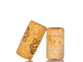 Two wine corks, macro, isolated on white background.