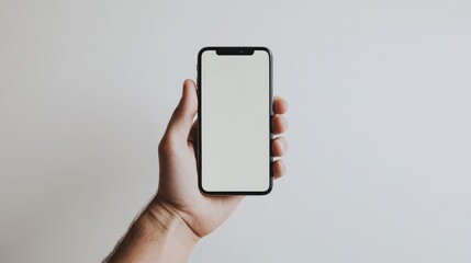 Holding a Phone with a Blank Screen, Minimalistic Background