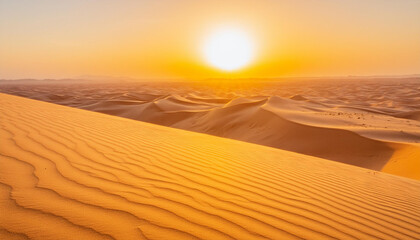 Sand dune against the backdrop of a sunset. Hot sunny weather in the desert. Global warming concept.