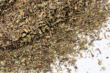 Fototapeta premium Dry basil spice seasoning macro texture top view