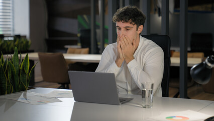 Shocked Caucasian businessman with laptop failure in office business man shock problem fail lose...