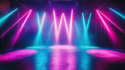 Vibrant stage lights create a dynamic atmosphere for concerts and events, blending pink and blue hues in a stylish performance space.