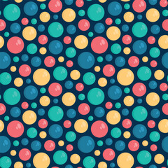 Seamless pattern of collection of colorful circular balls scattered on a dark background