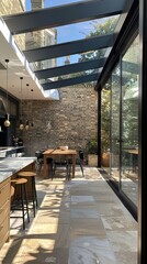 Panoramic view from within a side return extension, lightfilled with a modern kitchen, dining space, glazed roof, and seamless transition to an outdoor courtyard, Victorian architecture visible