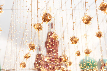 Illumination of Nikolskaya street in the center of Moscow.  Glowing decorations on a pedestri