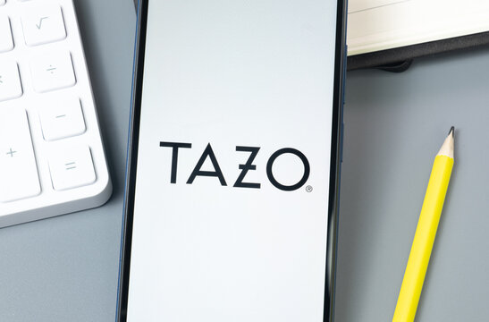 New York, USA - 30 August 2024: Tazo Logo on Phone Screen, Company Icon on Display
