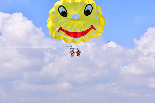 Parasaling over the sea . High quality photo