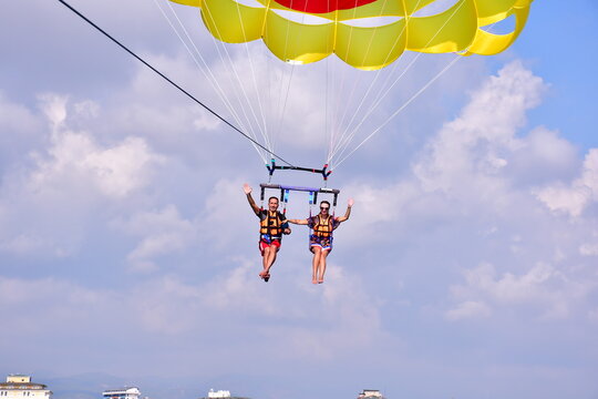 Parasaling over the sea . High quality photo