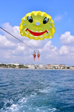 Parasaling over the sea . High quality photo