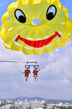 Parasaling over the sea . High quality photo
