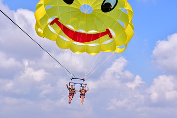 Parasaling over the sea . High quality photo