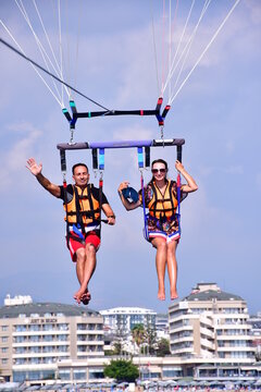 Parasaling over the sea . High quality photo