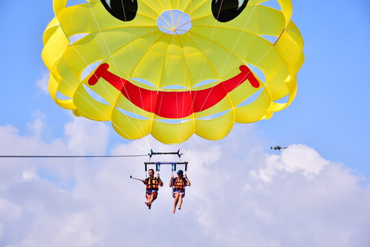 Parasaling over the sea . High quality photo