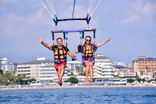 Parasaling over the sea . High quality photo