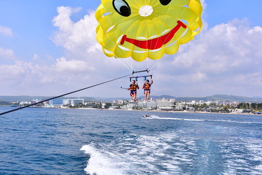 Parasaling over the sea . High quality photo