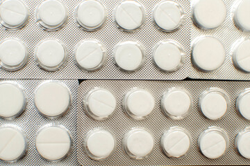 Medical drugs and pills in silver package	