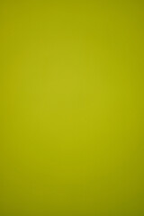 Yellow, green gradient background with metallic shiny effect. Vertical template for graphic design with copy space. High resolution photo. Full depth of field.