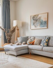 living room interior with a grey corner couch