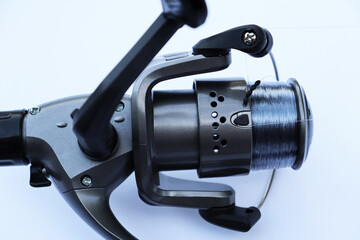 professional fishing reel on a white background