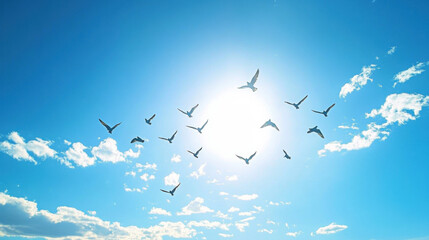 Fototapeta premium A tree in full bloom with green leaves stretching towards a clear blue sky, embodying growth and vitality.