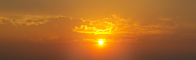 Panorama of evening sky with clouds. sunset Sky background, Sunrise sky with lighted clouds.