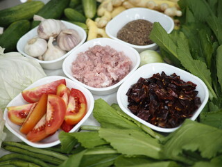Nam Prik Ong is a Northern Thai chili dip made from ground pork, tomatoes, and a fragrant blend of garlic, shallots, dried chilies, and fermented soybean paste.
