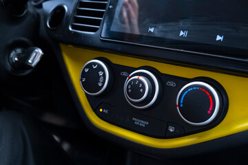 Car interior. close - up of car dashboard. car interior details. interior details. View of the car from the back seat. Windshield