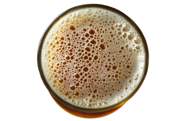Top view of a glass filled with frothy beer, showcasing bubbles and foam. Perfect for beverage-related concepts and brewing themes.
