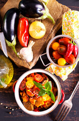 potato stew cooked with peppers, tomatoes, and onions, in bowl