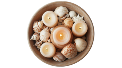 Top view of candles and seashells arranged in a wooden bowl, creating a serene and cozy atmosphere. Ideal for relaxation and spa themes.