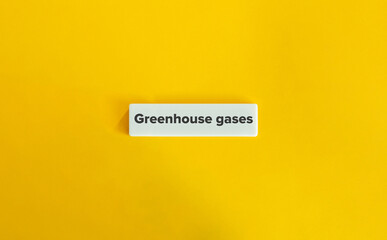 Greenhouse Gases Banner. Text on Block Letter Tile on Yellow Background. Minimal Aesthetic.