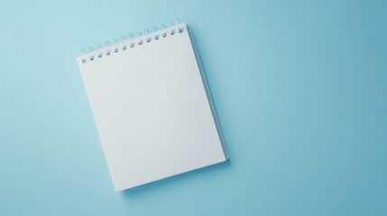 Blank paper desk spiral calendar mock-up. Minimal photography with copy space for your text. Empty 3d table calendar. Office and home decor. Bright minimalism background photography.