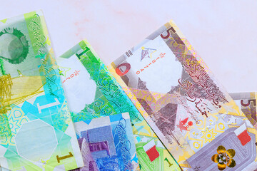 Bank of Qatar issued Qatari banknotes cash in various denominations in form of Qatari Riyals