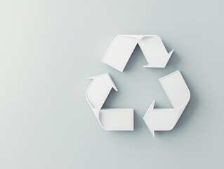 Fototapeta premium Simple geometric recycle symbol with smooth white lines on a soft grey background, minimalist eco concept