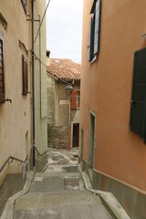 Narrow winding street in old Italian village