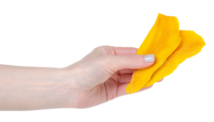 Dried mango in hand isolation