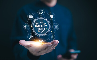 Safety first concept. Work safety compliance, A professional holds digital 