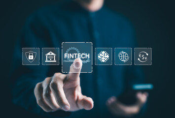 Fintech and financial technology concept. A person interacts with digital icons representing...
