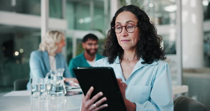 Tablet, mature woman and hospital office with research for medical finance or funding. Director, digital technology and clinic administrator meeting for healthcare, scroll or internet for information