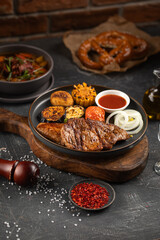 Portion of german grilled pork meat with vegetables