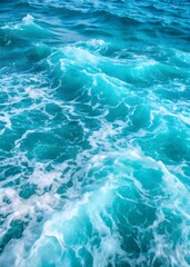 Fototapeta premium the mesmerizing turquoise swirls of the ocean's frothy waves with this captivating abstract image, perfect for conveying a sense of tranquility, fluidity, and the natural beauty of aquatic environment